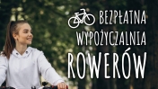 Dziewczyna na rowerze obok napis: Bezpłatna Wypożyczalnia Rowerów