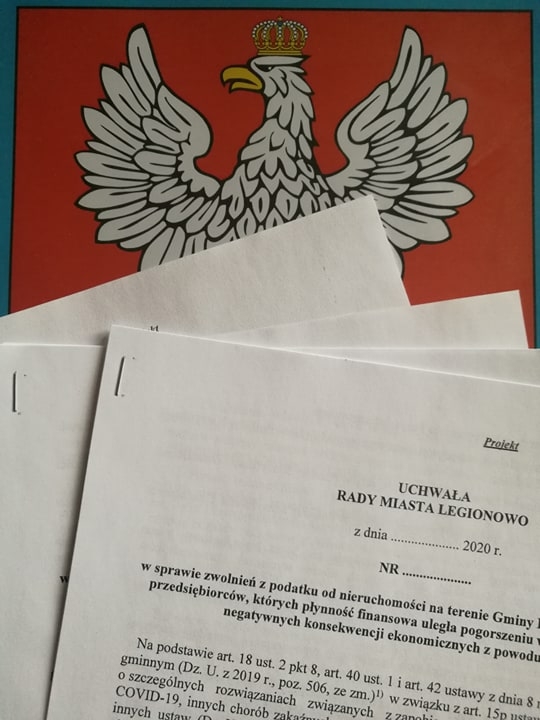 Projekty uchwał na tle herbu Legionowa