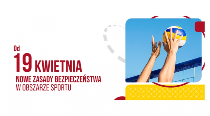 Ręce nad siatką. Piłka do siatkówki.